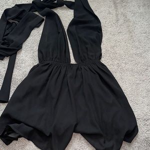 Perfect condition. Black romper! Can be worn so many different ways! Size small